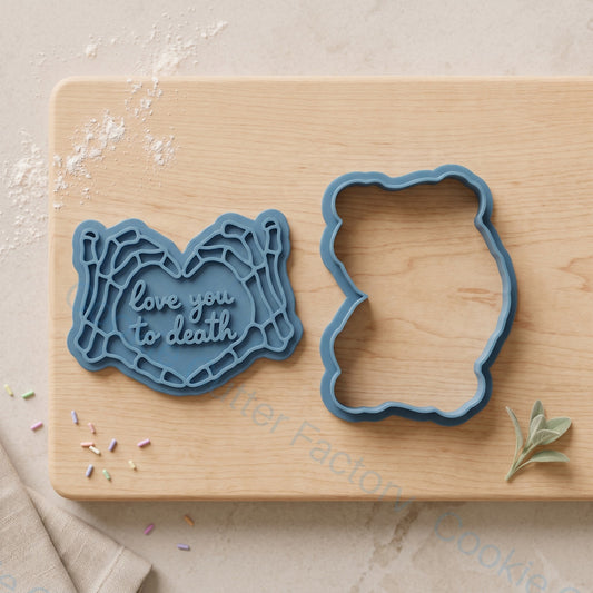 Skeleton Hands Heart Cookie Cutter and Stamp - Love You To Death Spooky | CCF_APPROVED_MEDIA_V1:2:e3e4f885c21adfeaa234dd12ccb27c7f7a0ea9571a1e6a6f3aa78cc3fa91105f