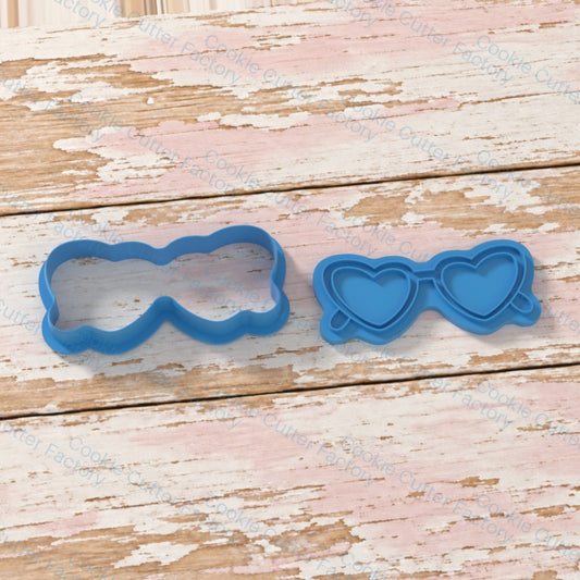 Heart Shaped Sunglasses Outline Cookie Cutter and Embosser Stamp | CCF_APPROVED_MEDIA_V1:2:6e337dc4d896e1afda3951a21d63aff2bb423d44c5886b7ec64b4c3dd52a0897