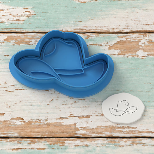 Cowboy Hat cutter and embosser with a rendered fondant impression example.