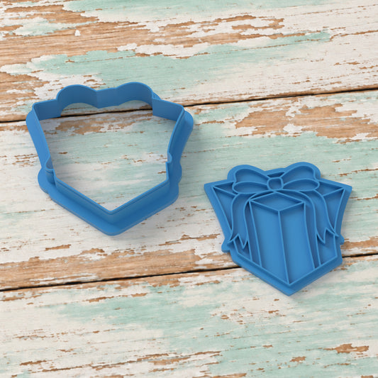 Gift Box with Bow cookie cutter and matching embosser on coastal timber.