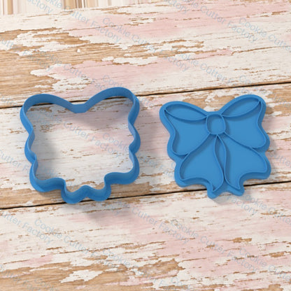 Classic Symmetrical Ribbon Bow Cookie Cutter and Embosser Stamp | CCF_APPROVED_MEDIA_V1:2:d6d1f4d6beafd07671dc2f08be44f2440e61f1e4590757c7ef8820d6d21cc776