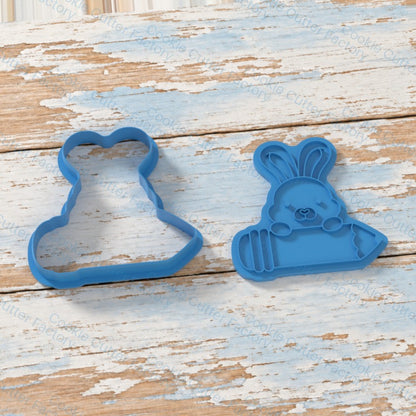 Bunny Holding Pencil Cookie Cutter and Embosser Stamp | CCF_APPROVED_MEDIA_V1:2:1b81497b9b7dd0a8f43028845f9895763f4cb682290bd95dadf3bb27e93e6e94