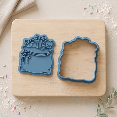 Christmas Gift Sack Cookie Cutter and Embosser Stamp - Festive Baking | CCF_APPROVED_MEDIA_V1:2:93a3e1048b34db8110e06015eb8fdf1a3e8eacb0125fc85e15fb5fe3539a1b9f