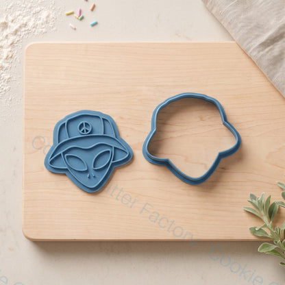 Alien in Bucket Hat Cookie Cutter and Embosser Stamp - Sci-Fi Party | CCF_APPROVED_MEDIA_V1:2:e180acef34e070f70523455e0cf958530a5ea59c11e0ba742f99bc156a6ac769