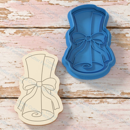 Tied Diploma Scroll with Bow Cookie Cutter and Embosser Stamp | CCF_APPROVED_MEDIA_V1:1:dd5c68863e27f8b655dadc19d6799a42a5de2e1c9b04bcb81da1afd0c8673ad7