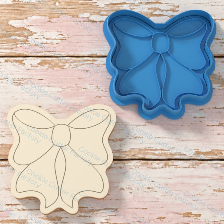 Classic Symmetrical Ribbon Bow Cookie Cutter and Embosser Stamp | CCF_APPROVED_MEDIA_V1:1:ff12e9c8e238c27f322377cb0469e193b701d8d8d44b33aadb9e79a77cac39a3